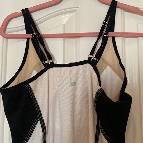 Tennis dress black and white fits longer. - Picture 2 of 2